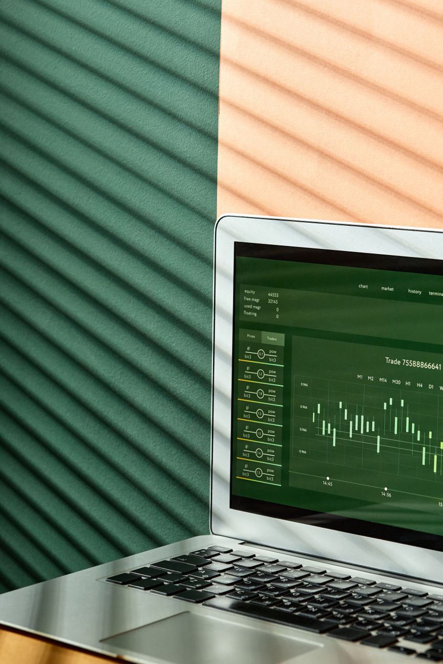 modern laptop displaying analytics charts